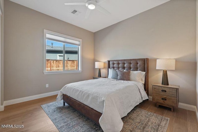 9220 Wild Skies Ct, Reno, NV 89523 - bedroom featuring baseboards, wood finished floors, and a ceiling fan