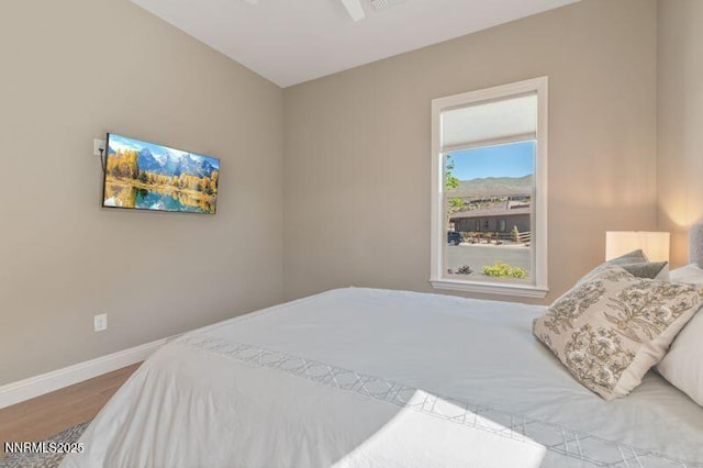 9220 Wild Skies Ct, Reno, NV 89523 - bedroom with wood finished floors and baseboards