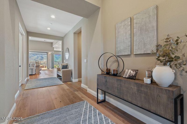 9220 Wild Skies Ct, Reno, NV 89523 - corridor with wood finished floors, baseboards, and recessed lighting