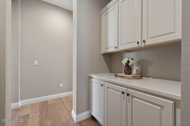 9220 Wild Skies Ct, Reno, NV 89523 - bar area featuring baseboards and light wood-style flooring