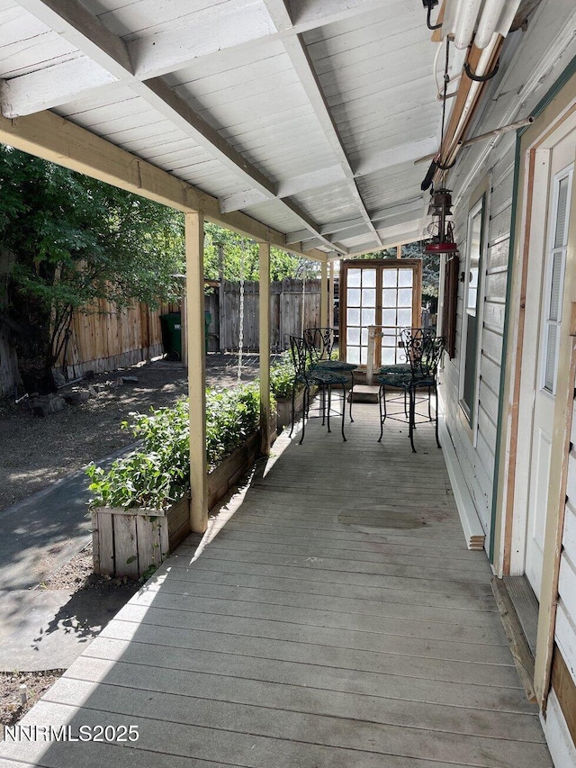 1303 N Division St, Carson City, NV 89703 - wooden deck with a fenced backyard