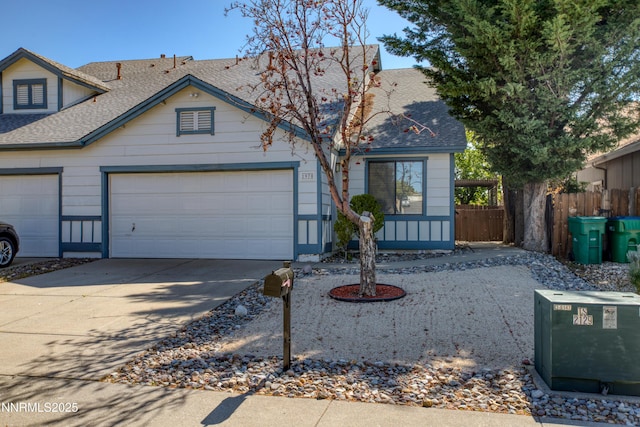 1970 Sierra Highlands Dr, Reno, NV 89523 - view of front of property featuring a shingled roof, concrete driveway, and a garage