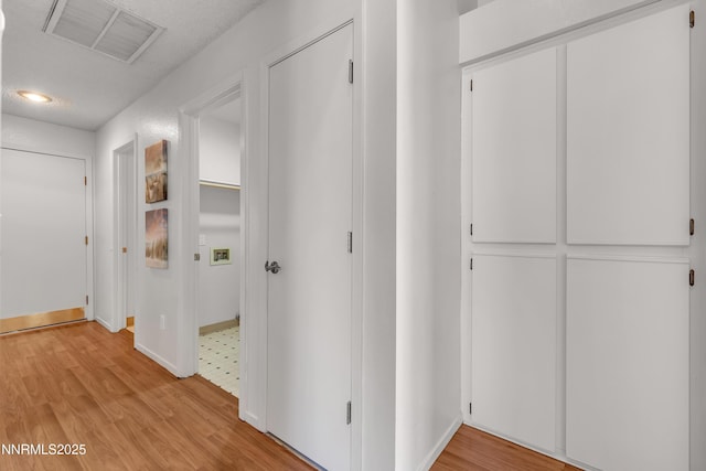 1970 Sierra Highlands Dr, Reno, NV 89523 - corridor with light wood-style flooring and baseboards