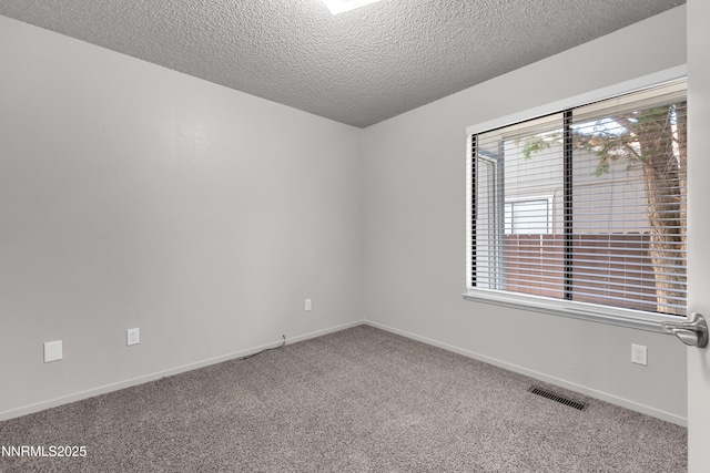 1970 Sierra Highlands Dr, Reno, NV 89523 - carpeted spare room with a textured ceiling and baseboards