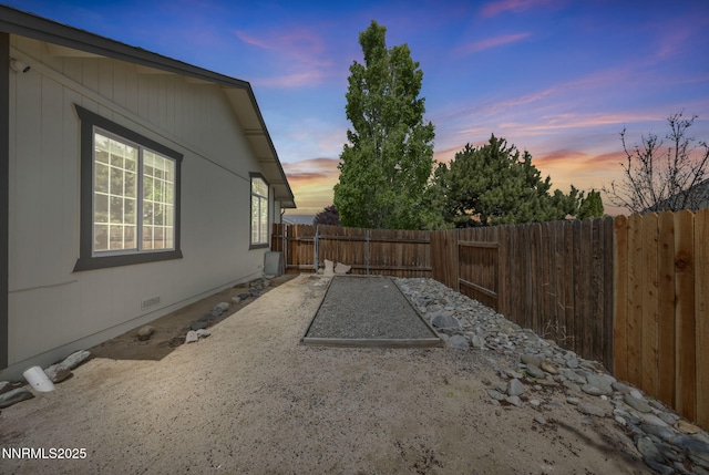 1458 Rosy Finch Dr, Sparks, NV 89441 - property exterior at dusk with a fenced backyard and crawl space