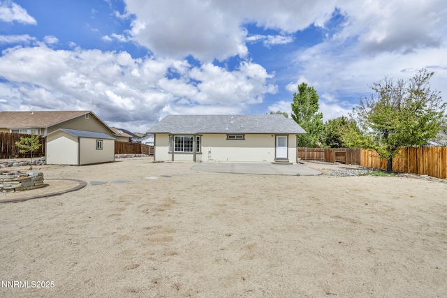 1458 Rosy Finch Dr, Sparks, NV 89441 - back of property with a patio area and a fenced backyard
