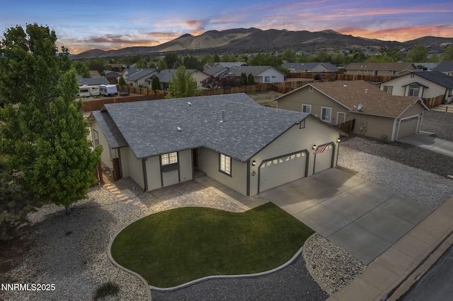 1458 Rosy Finch Dr, Sparks, NV 89441 - aerial view at dusk of a residential view and a mountain view