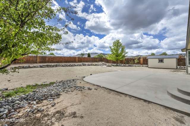 1458 Rosy Finch Dr, Sparks, NV 89441 - fenced backyard featuring a patio and an outdoor structure