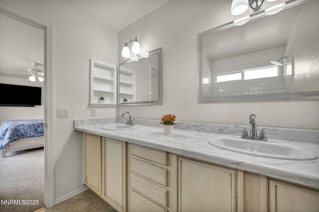 1458 Rosy Finch Dr, Sparks, NV 89441 - bathroom featuring double vanity, ensuite bathroom, and ceiling fan
