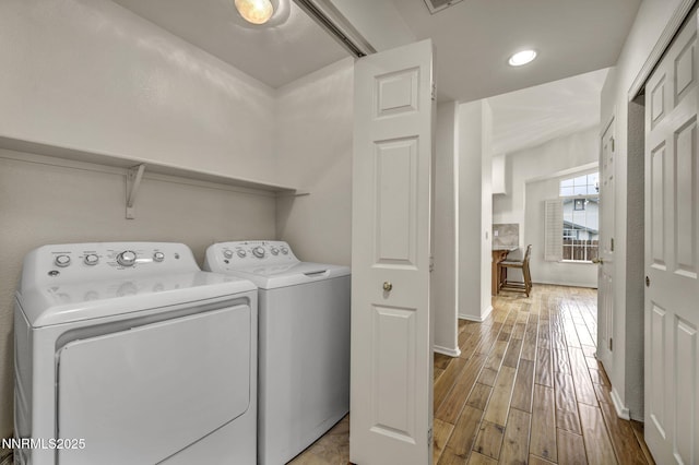 1458 Rosy Finch Dr, Sparks, NV 89441 - laundry area with separate washer and dryer, light wood finished floors, baseboards, and recessed lighting