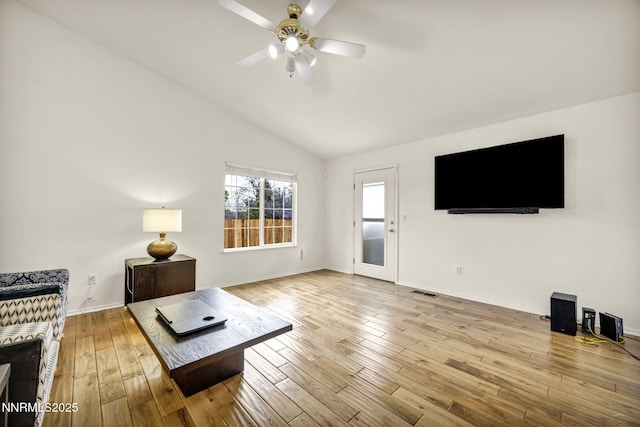 1458 Rosy Finch Dr, Sparks, NV 89441 - living room with ceiling fan, hardwood / wood-style floors, vaulted ceiling, and baseboards