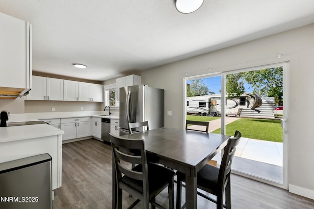 495 Margrave Dr, Reno, NV 89502 - dining area with wood finished floors