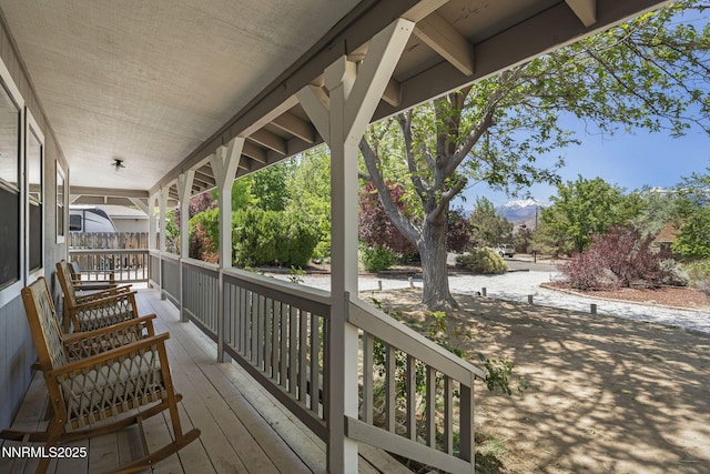 14690 Rancheros Dr, Reno, NV 89521 - wooden porch with a mountain view