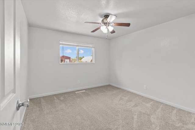 1235 Koontz Ln, Carson City, NV 89701 - carpeted empty room featuring ceiling fan, baseboards, and a textured ceiling