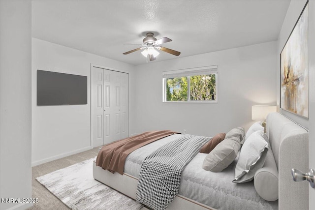 1235 Koontz Ln, Carson City, NV 89701 - carpeted bedroom featuring a closet, ceiling fan, and baseboards