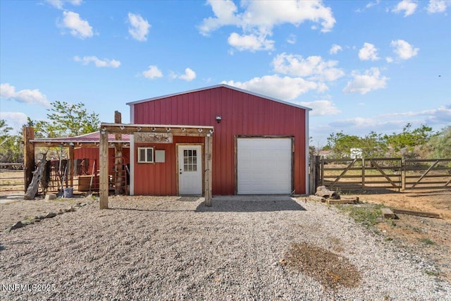 1235 Koontz Ln, Carson City, NV 89701 - view of outbuilding featuring gravel driveway and an exterior structure