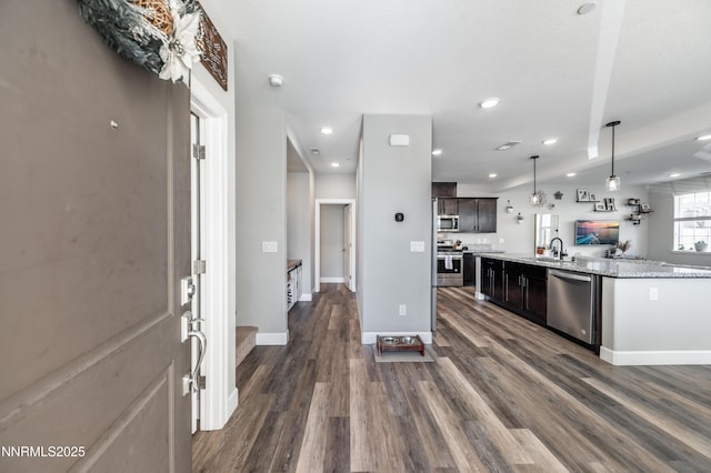 1845 Sea Horse Rd Unit C, Reno, NV 89521 - kitchen featuring stainless steel appliances, open floor plan, dark wood-style floors, recessed lighting, and baseboards