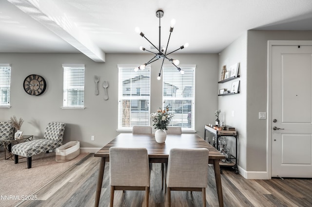 1845 Sea Horse Rd Unit C, Reno, NV 89521 - dining area featuring a chandelier, wood finished floors, and baseboards