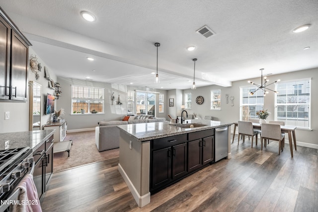 1845 Sea Horse Rd Unit C, Reno, NV 89521 - kitchen with a sink, appliances with stainless steel finishes, wood finished floors, hanging light fixtures, and baseboards