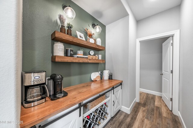 1845 Sea Horse Rd Unit C, Reno, NV 89521 - bar with dark wood-type flooring and baseboards