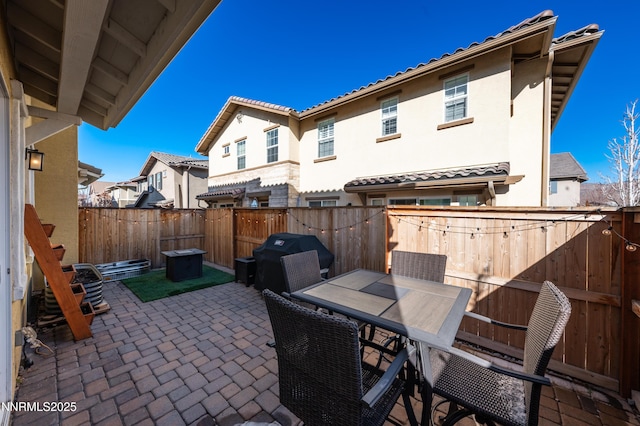 1845 Sea Horse Rd Unit C, Reno, NV 89521 - fenced backyard with a patio, grilling area, and a residential view