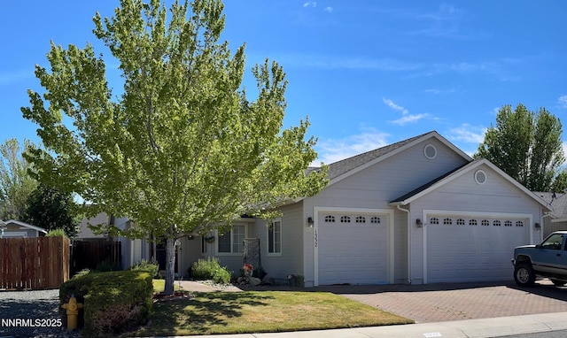 1332 Brooke Way, Gardnerville, NV 89410 - view of front facade with an attached garage and decorative driveway