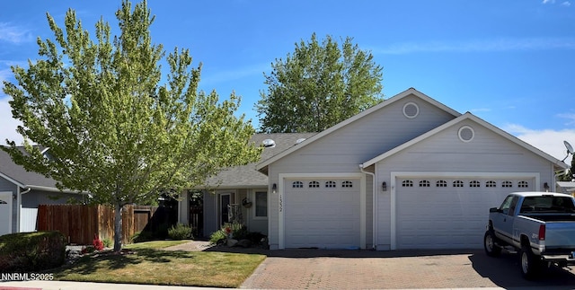 1332 Brooke Way, Gardnerville, NV 89410 - ranch-style house featuring decorative driveway, a garage, and a shingled roof