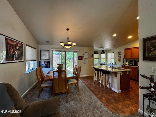 1332 Brooke Way, Gardnerville, NV 89410 - dining room with vaulted ceiling, a chandelier, dark tile patterned flooring, recessed lighting, and baseboards