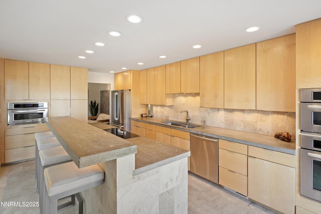 2260 Stone Mountain Cir, Reno, NV 89519 - kitchen with light brown cabinetry, a sink, stainless steel appliances, a center island, and backsplash