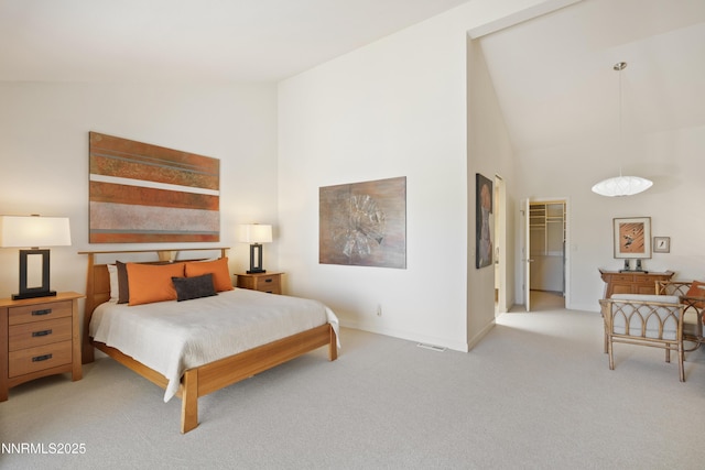 2260 Stone Mountain Cir, Reno, NV 89519 - bedroom featuring light colored carpet, high vaulted ceiling, baseboards, and a spacious closet