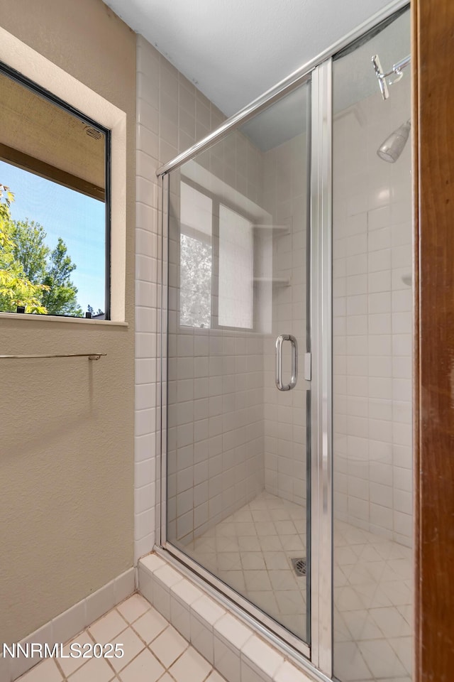 2593 Chaparral Ct, Reno, NV 89509 - bathroom with a shower stall and tile patterned floors