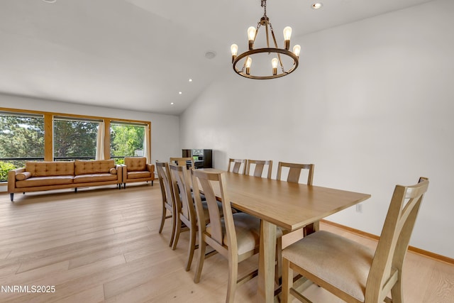 2593 Chaparral Ct, Reno, NV 89509 - dining room with lofted ceiling, a chandelier, light wood-style floors, and recessed lighting