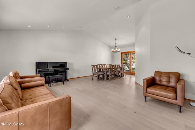 2593 Chaparral Ct, Reno, NV 89509 - living area with a chandelier, lofted ceiling, light wood-style floors, recessed lighting, and baseboards