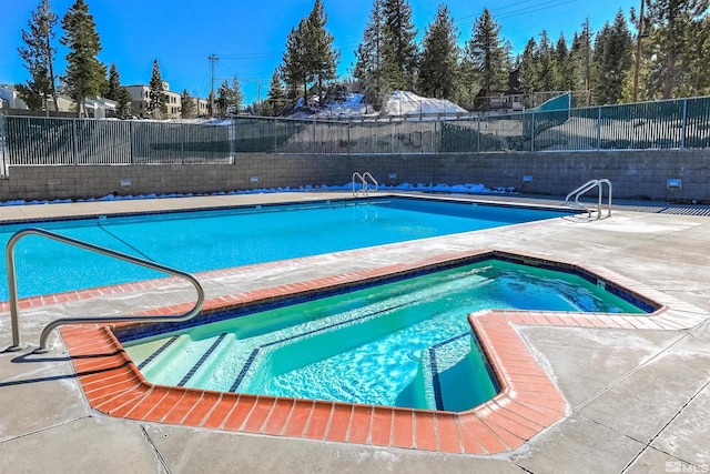 313 Tramway Dr Unit 7, Stateline, NV 89449 - community pool featuring a community hot tub and a patio area