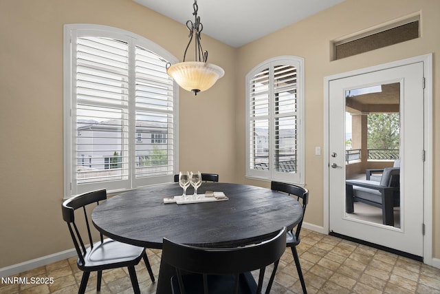 9900 Wilbur May Pkwy Unit 2406, Reno, NV 89521 - dining space featuring stone finish flooring and baseboards