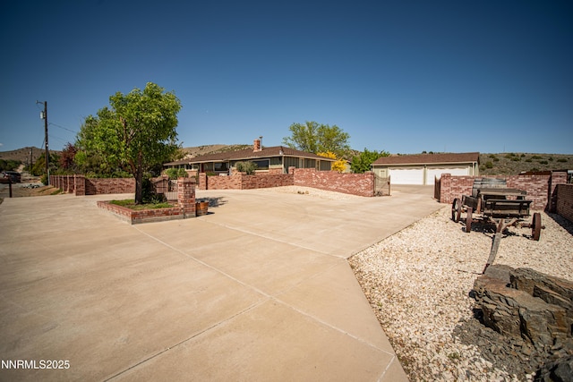 9100 Wigwam Way, Reno, NV 89506 - view of front of property featuring a detached garage