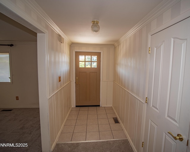 9100 Wigwam Way, Reno, NV 89506 - doorway to outside featuring a decorative wall, light colored carpet, and ornamental molding