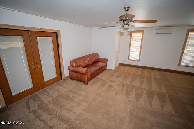 9100 Wigwam Way, Reno, NV 89506 - unfurnished room featuring french doors, a wall unit AC, light colored carpet, baseboards, and ceiling fan