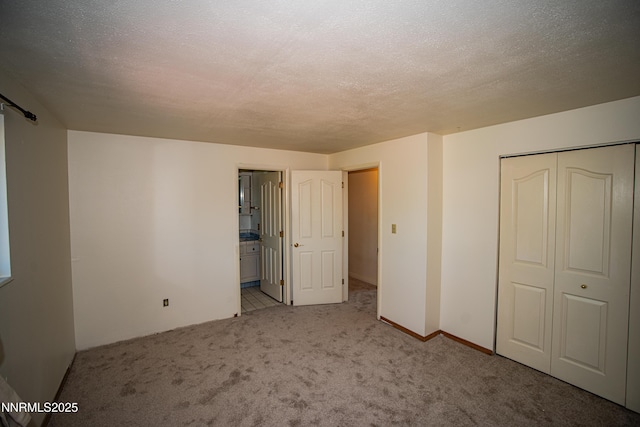 9100 Wigwam Way, Reno, NV 89506 - unfurnished bedroom with carpet flooring, a closet, a textured ceiling, and ensuite bath