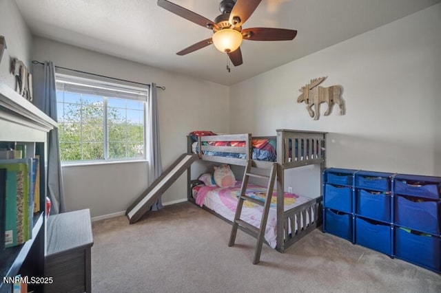 1061 Aimee Ln, Fallon, NV 89406 - carpeted bedroom with baseboards and a ceiling fan