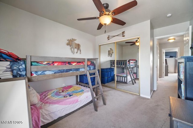 1061 Aimee Ln, Fallon, NV 89406 - carpeted bedroom with a closet, a ceiling fan, and baseboards
