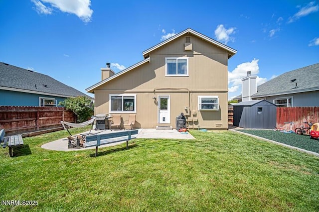 1061 Aimee Ln, Fallon, NV 89406 - rear view of property featuring a patio area and a chimney
