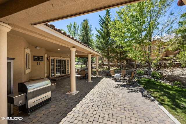 14501 Quail Rock Ct, Reno, NV 89511 - view of patio / terrace featuring area for grilling and outdoor dining area