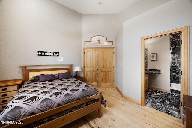 14501 Quail Rock Ct, Reno, NV 89511 - bedroom with wood finished floors and baseboards
