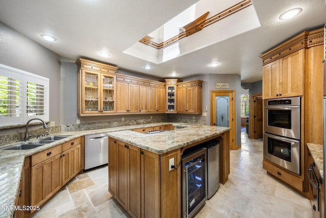 14501 Quail Rock Ct, Reno, NV 89511 - kitchen with a sink, stainless steel appliances, beverage cooler, a tray ceiling, and light stone counters