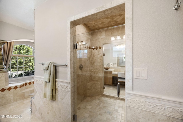 14501 Quail Rock Ct, Reno, NV 89511 - full bathroom featuring a stall shower, vanity, tile patterned flooring, tiled tub, and wainscoting