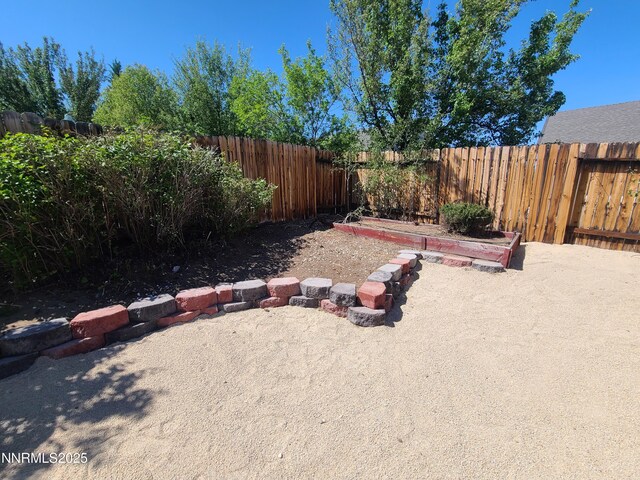 580 Boulder Peak Ct, Sparks, NV 89436 - fenced backyard featuring a patio area