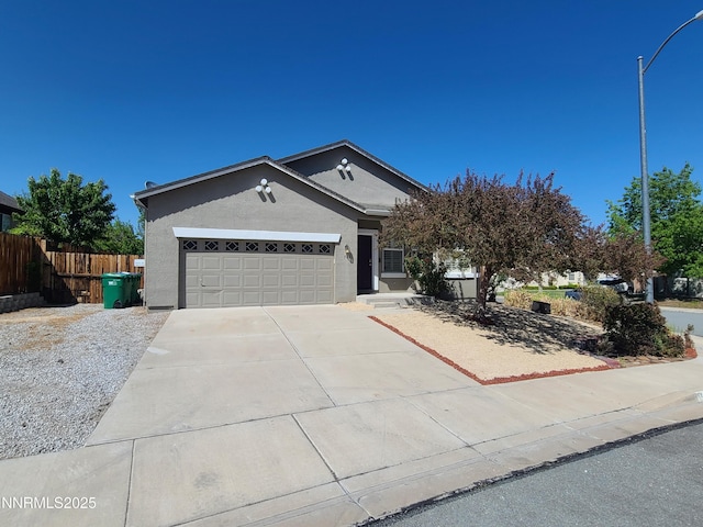 580 Boulder Peak Ct, Sparks, NV 89436 - single story home with stucco siding, a garage, and concrete driveway