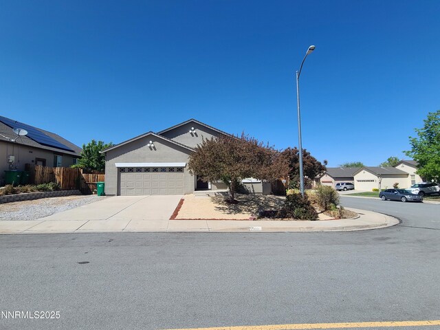 580 Boulder Peak Ct, Sparks, NV 89436 - view of front of home featuring stucco siding, a garage, and driveway