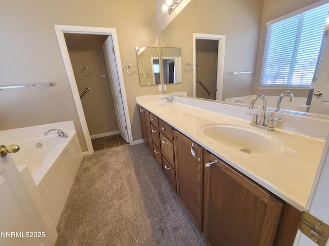580 Boulder Peak Ct, Sparks, NV 89436 - bathroom featuring double vanity, a garden tub, and baseboards